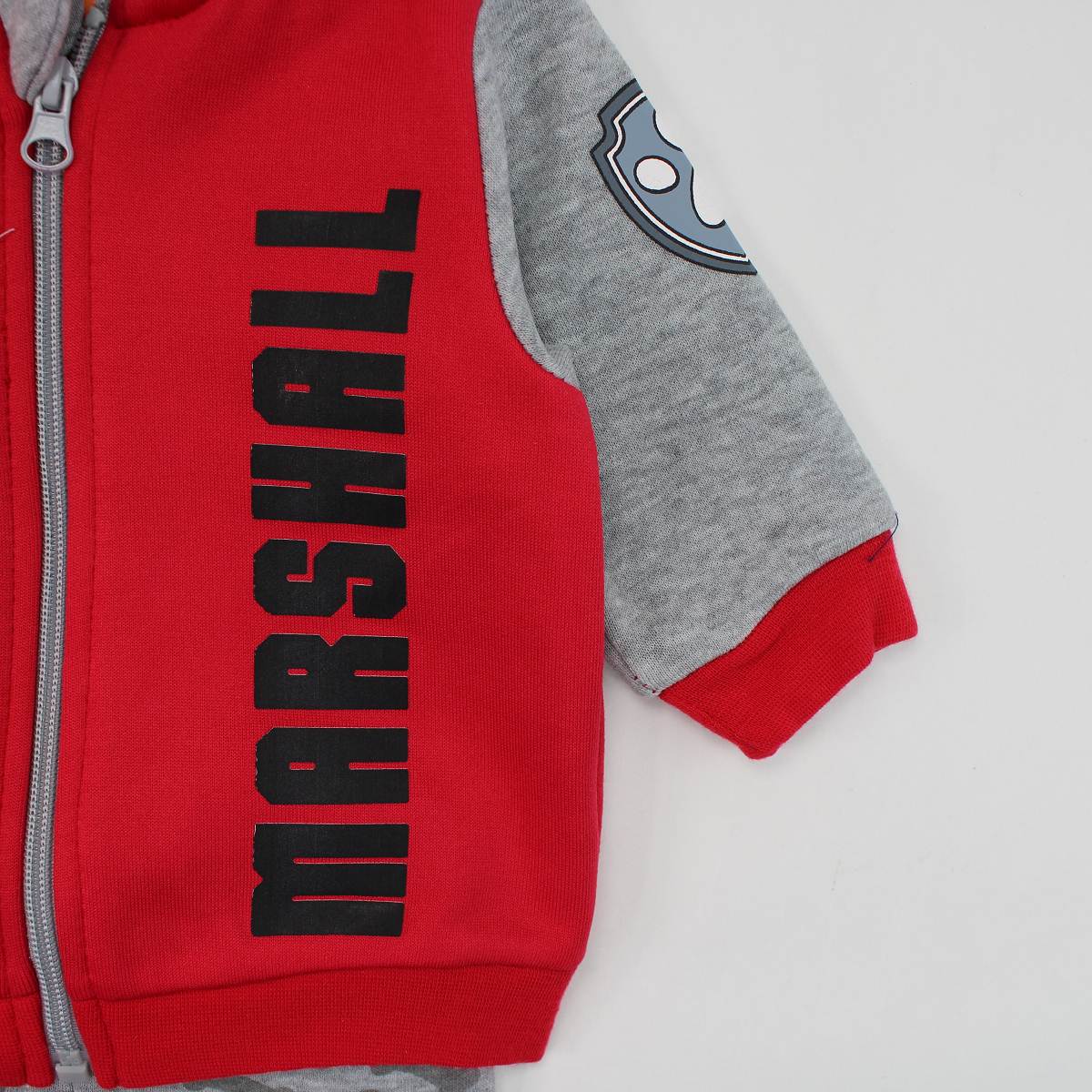Trening Paw Patrol Marshall - detaliu text MARSHALL și fermoar roșu